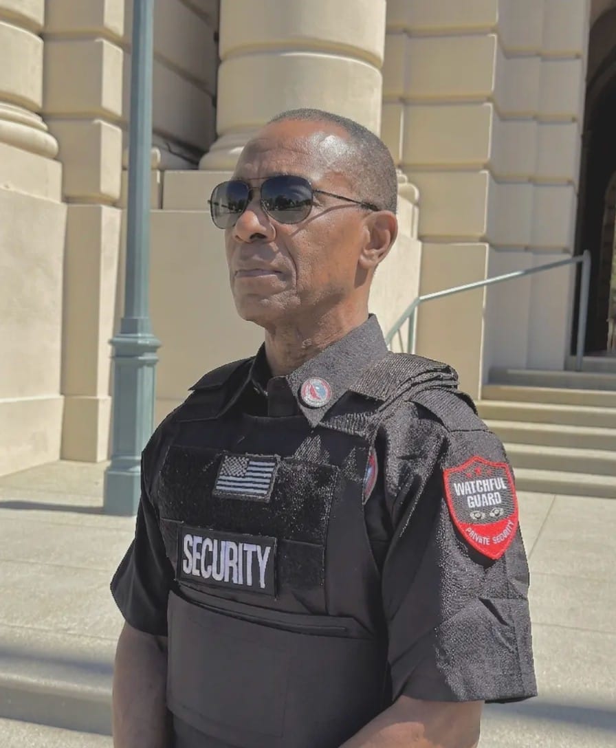 BSIS licensed armed security guard reviewing post orders before shift